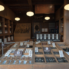 Yamatoya Grocery Store, Edo-Tokyo Open Air Architectural Museum (relocated from Minato Ward, Tokyo), 2017<br>"This is a wooden, three-story sturcture built in 1928 in Shiro-kanedai, Minato Ward. It is a rare, special building featuring the disproportionately tall facade of kanban (signboard) architecture and traditional protruding beams (dashigeta-zukuri), on the third floor. Aspects of the pre-war grocery store are duplicated inside. [4-chome, Shirokanedai, Minato Ward, 1928.]"